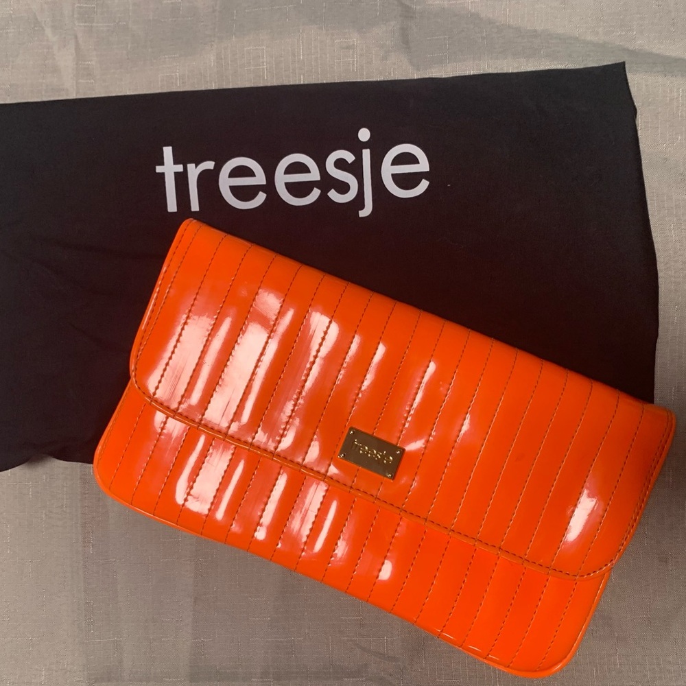 Tressje orange clutch bag